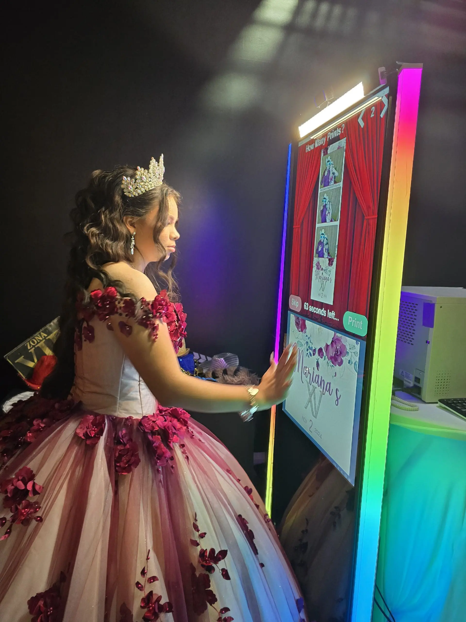 Quinceañera guests enjoying photo booth